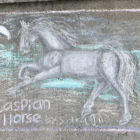 Chalk drawing of a white Caspian horse running through blue water or waves, with “Caspian Horse” written at the bottom.